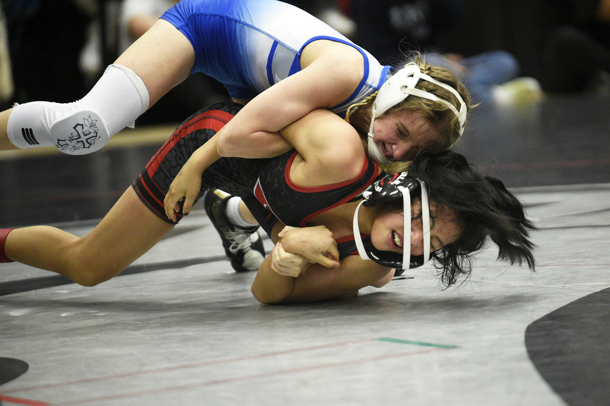 Leah Wallway of La Center (top) wrestles Jasmine Cha of Camas in the girls final at 105 pounds at the 53rd annual Norm Friehauf Clark County Championships wrestling tournament at Union High School on Saturday, Jan. 27, 2024.