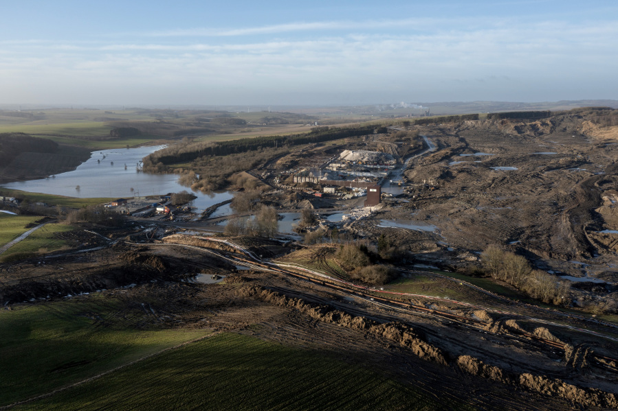 The area affected by a landslide of several million tonnes contaminated soil is pictured, near the village of Oelst, near Randers, Denmark, Thursday Jan. 25, 2024. On Monday, Prime Minister Mette Frederiksen said that &ldquo;of course, it would be totally unfair if the children in Randers or elderly have to pay this bill,&rdquo; after visiting the site with a 75-meter (82-yard) tall heap of dirt at the Nordic Waste reprocessing plant site with 3 million cubic meters (3,923,852 cubic yard) of contaminated soil.