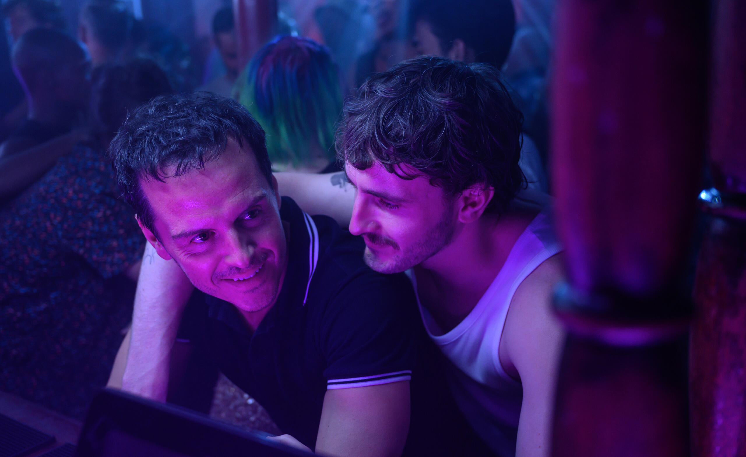 Andrew Scott, left, and Paul Mescal in the movie “All of Us Strangers.” (Parisa Taghizadeh/Searchlight Pictures/TNS)