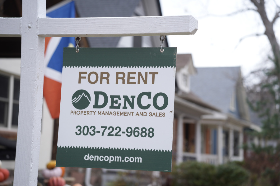 File - A sign advertising a rental stands outside a residence on Nov. 23, 2023, in Denver. The cost to rent an apartment has soared, and is still growing faster than before the pandemic.