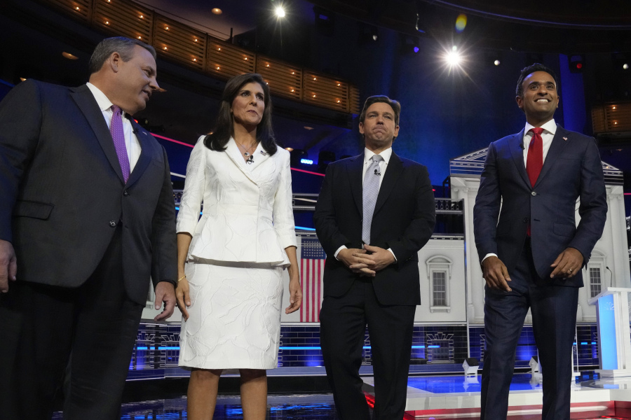 Republican presidential candidates from left, former New Jersey Gov. Chris Christie, former UN Ambassador Nikki Haley, Florida Gov. Ron DeSantis, and businessman Vivek Ramaswamy stand on stage before a Republican presidential primary debate hosted by NBC News Wednesday, Nov. 8, 2023, at the Adrienne Arsht Center for the Performing Arts of Miami-Dade County in Miami.