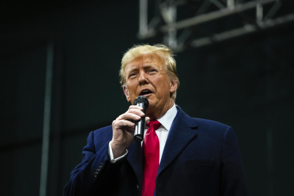 Republican presidential candidate former President Donald Trump speaks to caucusgoers, Monday, Jan. 15, 2024, at Horizon Events Center in Clive, Iowa.