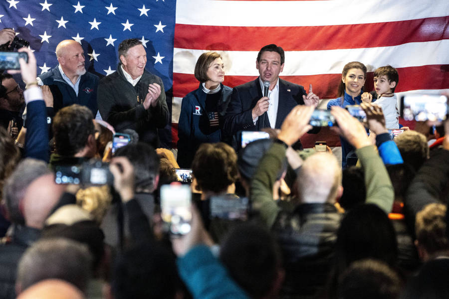 Florida Gov. Ron Desantis speaks to a packed room of supporters on Saturday, Jan. 13, 2024, at the Never Back Down Campaign Headquarters in West Des Moines, Iowa.