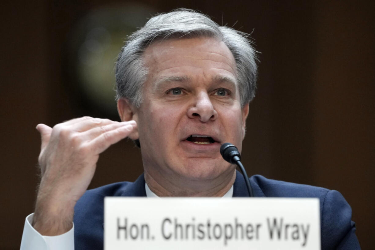 FILE - FBI Director Christopher Wray testifies before a Senate Judiciary Committee oversight hearing on Capitol Hill in Washington, Dec. 5, 2023. Wray is preparing to tell House lawmakers that Chinese government hackers are busily targeting water treatment plants, the electrical grid, transportation systems and other critical infrastructure inside the United States.