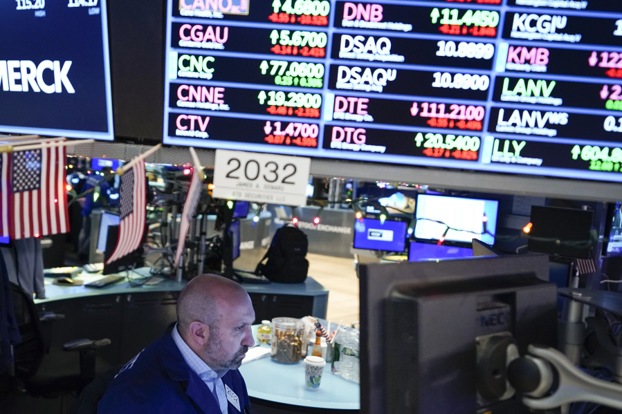 Traders work on the floor at the New York Stock Exchange in New York, Wednesday, Jan. 3, 2024.