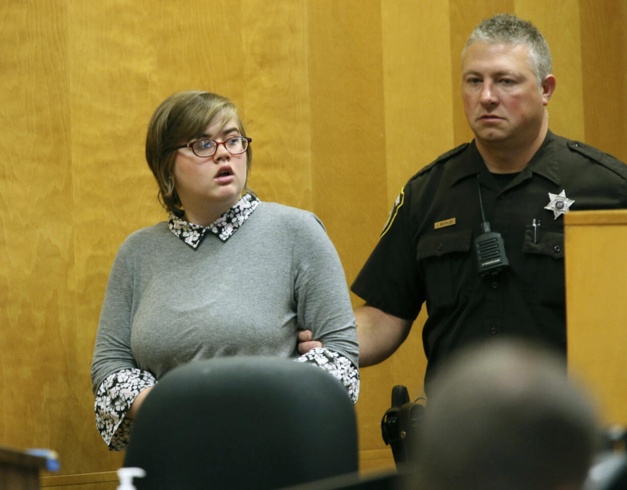 FILE - Morgan Geyser enters a Waukesha County courtroom for a status hearing, Sept. 29, 2017, in Waukesha, Wis. Geyser, one of two Wisconsin women accused of stabbing a classmate nearly to death almost a decade ago to please horror character Slender Man, again asked a judge on Tuesday, Jan. 16, 2024, to release her from a mental institution. The judge has set a scheduling conference on the request for Monday, Jan. 29.