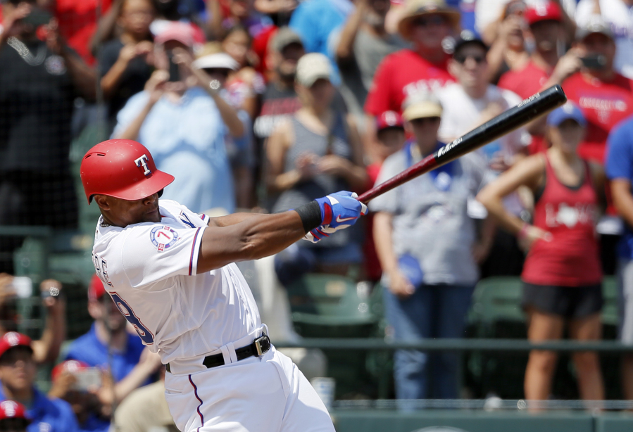FILE - Texas Rangers&rsquo; Adrian Beltre follows through on a double for his 3,000th career hit which came off a pitch from Baltimore Orioles&rsquo; Wade Miley in the fourth inning of a baseball game, Sunday, July 30, 2017, in Arlington, Texas. Beltr&eacute; could soon be a first-ballot baseball Hall of Fame third baseman. He is among 12 first-timers in consideration for the Class of 2024 that will be revealed Jan. 23.