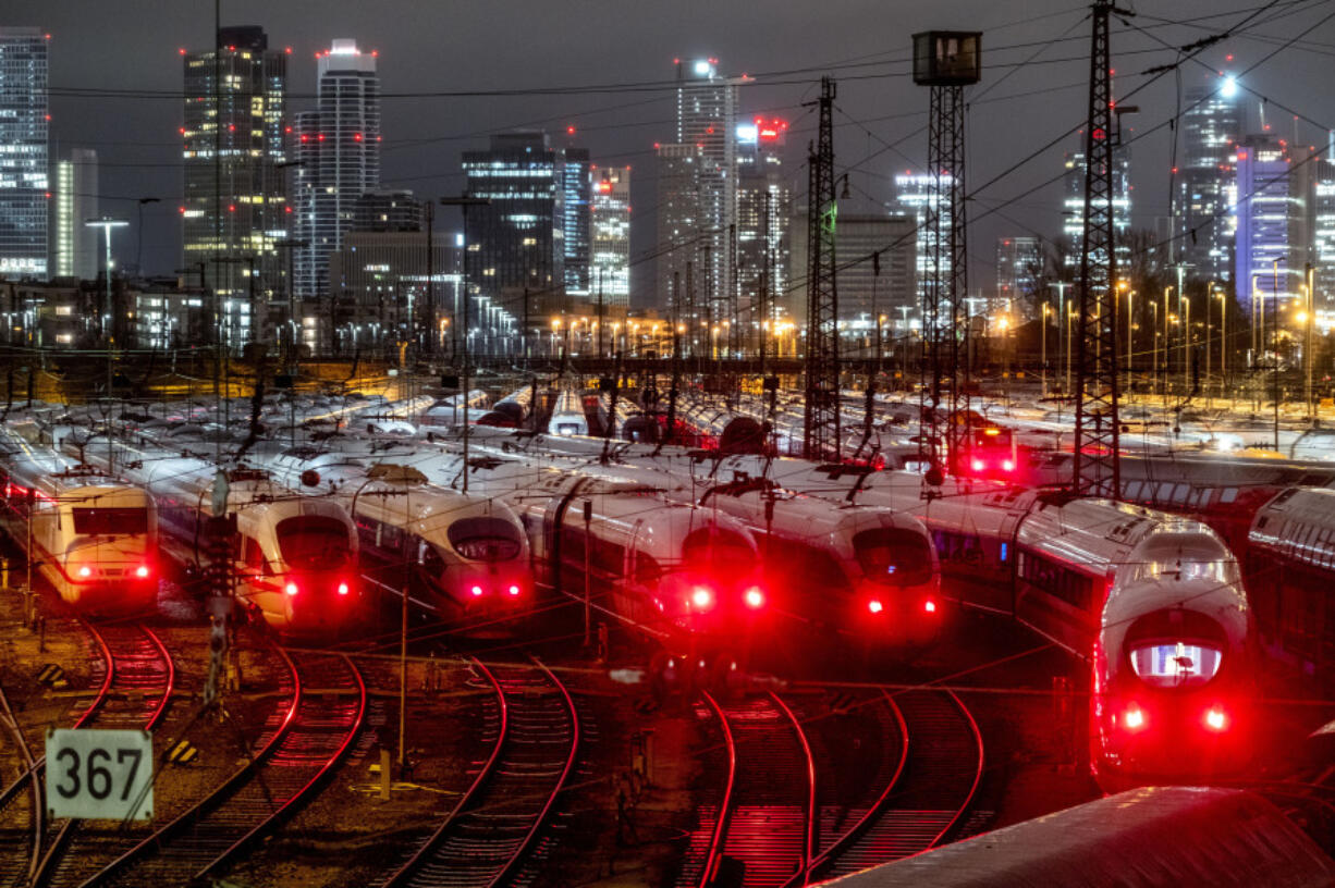 File - Trains are parked outside the central station in Frankfurt, Germany on Jan. 24, 2024 during a planned six-day strike. The International Monetary Fund downgraded the outlook for some countries as Europe continues to struggle with dispirited consumers and the lingering effects of the energy price shock caused by the Russian invasion of Ukraine.