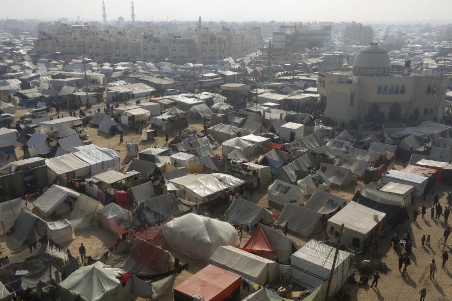 A view of the makeshift tent camp where Palestinians displaced by the Israeli bombardment of the Gaza Strip are staying, in the Muwasi area on Monday. Israel has encouraged Palestinians to move to Muwasi, declaring the thin coastal strip a safe zone.