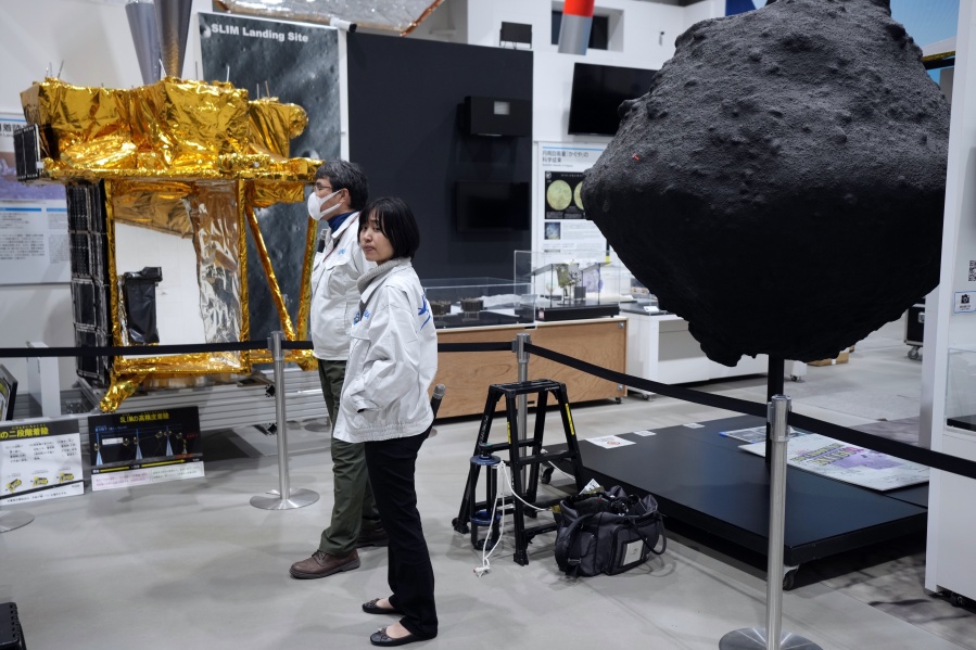 Staff of Japan Aerospace Exploration Agency (JAXA) prepare to watch a live streaming of the pinpoint moon landing operation by the Smart Lander for Investigating Moon (SLIM) spacecraft at JAXA&rsquo;s Sagamihara Campus Friday, Jan. 19, 2024, in Sagamihara near Tokyo.