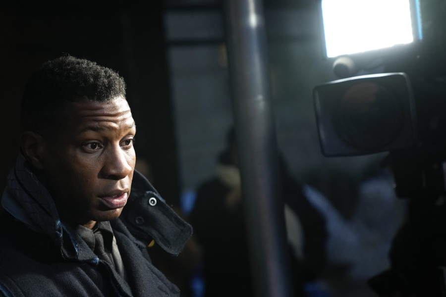 FILE - Jonathan Majors leaves the Manhattan criminal courthouse in New York, Dec. 18, 2023. In his first interview since his assault and harassment conviction last month, Majors says he was shocked by the New York jury&rsquo;s verdict, Monday, Jan. 8, 2024.
