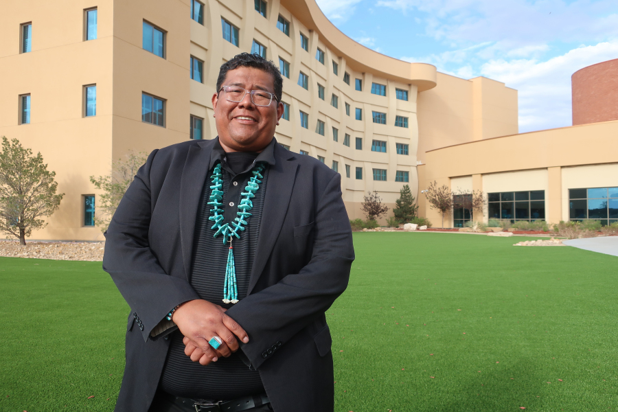 FILE - Dineh Benally poses for a photograph before a Navajo Nation presidential forum at a tribal casino outside Flagstaff, Ariz., Tuesday, June 21, 2022. Authorities on the largest Native American reservation in the U.S. have charged Dineh Benally and Farley BlueEyes, two tribal members with illegally growing marijuana on the Navajo Nation, marking just the latest development in a years-long case that also has involved allegations of forced labor, Thursday, Jan. 4, 2024.