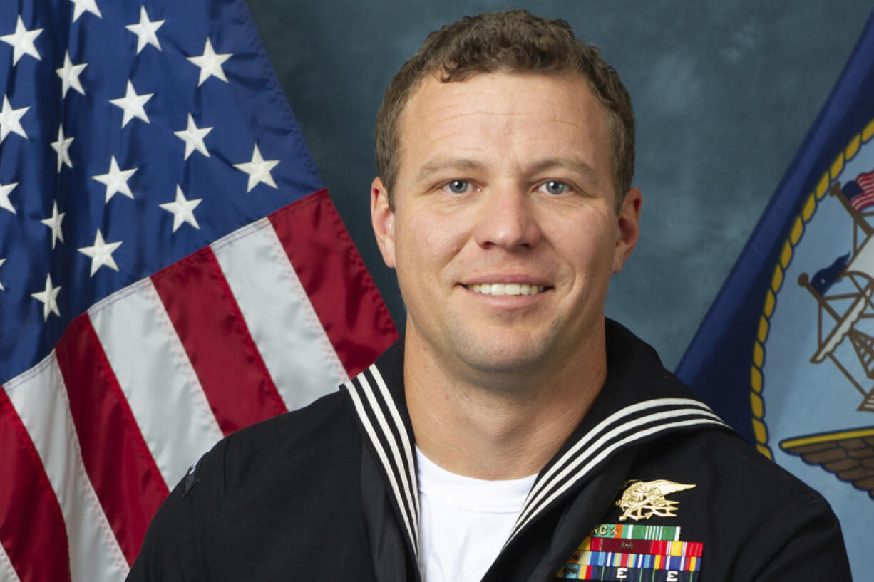 FILE - This photo provided by the Department of Defense shows Navy Special Warfare Operator 1st Class Christopher J. Chambers. Chambers is one of the two SEALs who were lost at sea during a raid on a boat carrying illicit Iranian-made weapons to Yemen.
