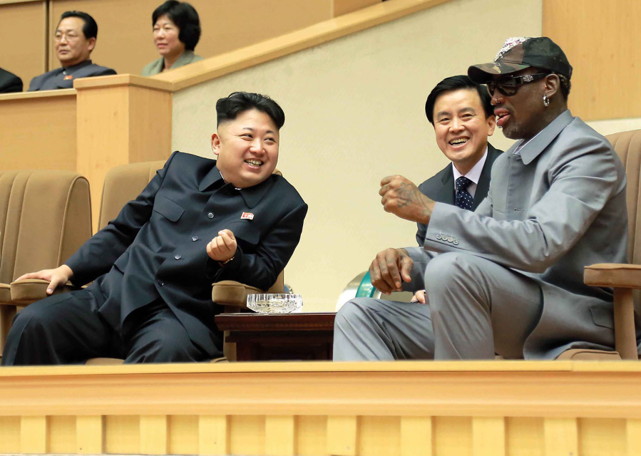 FILE - In this photo provided by the North Korean government, North Korean leader Kim Jong Un, left, talks with former NBA player Dennis Rodman, right, as they watch an exhibition basketball game at an indoor stadium in Pyongyang on Jan. 8, 2014. The content of this image is as provided and cannot be independently verified.
