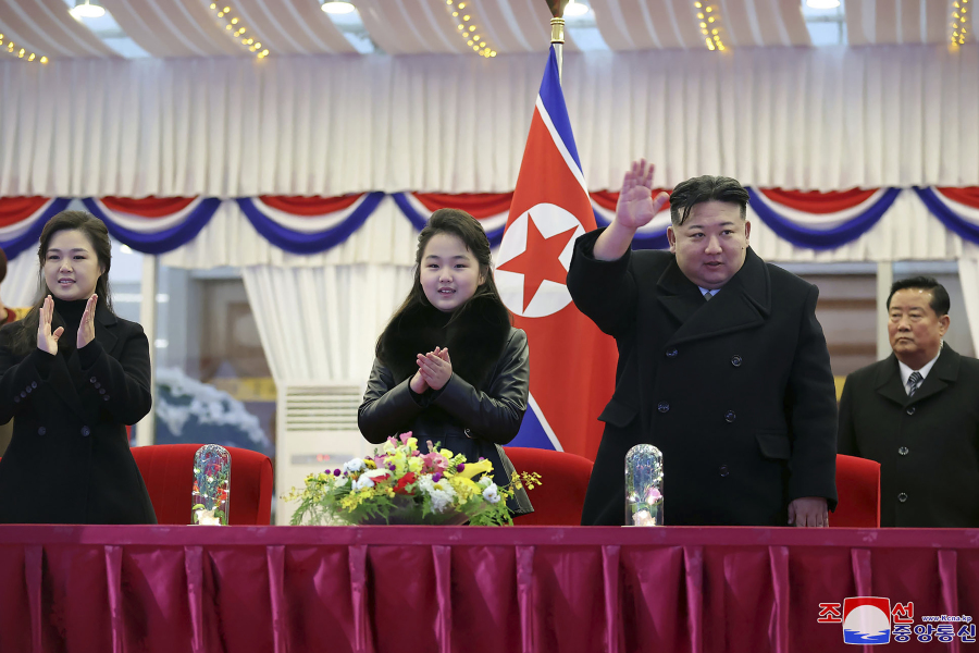 FILE - In this photo provided by the North Korean government, North Korean leader Kim Jong Un, second right, with his daughter and his wife Ri Sol Ju, left, attends a performance to celebrate the New Year in Pyongyang, North Korea, Sunday, Dec. 31, 2023. Independent journalists were not given access to cover the event depicted in this image distributed by the North Korean government. The content of this image is as provided and cannot be independently verified. Korean language watermark on image as provided by source reads: &ldquo;KCNA&rdquo; which is the abbreviation for Korean Central News Agency.