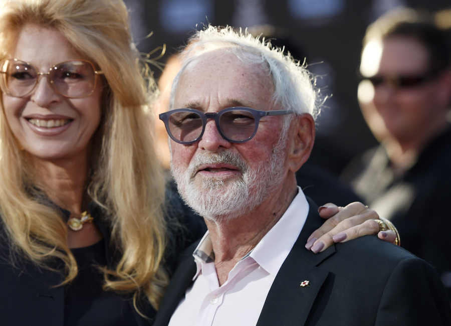 FILE - Norman Jewison, center, director of the 1967 film &quot;In the Heat of the Night,&quot; appears with his wife Lynne St. David before a 50th anniversary screening of the film at the 2017 TCM Classic Film Festival in Los Angeles on April 6, 2017. Jewison, a three-time Oscar nominee who in 1999 received an Academy Award for lifetime achievement, died &ldquo;peacefully&rdquo; Saturday, Jan. 20, 2024, according to publicist Jeff Sanderson. He was 97.