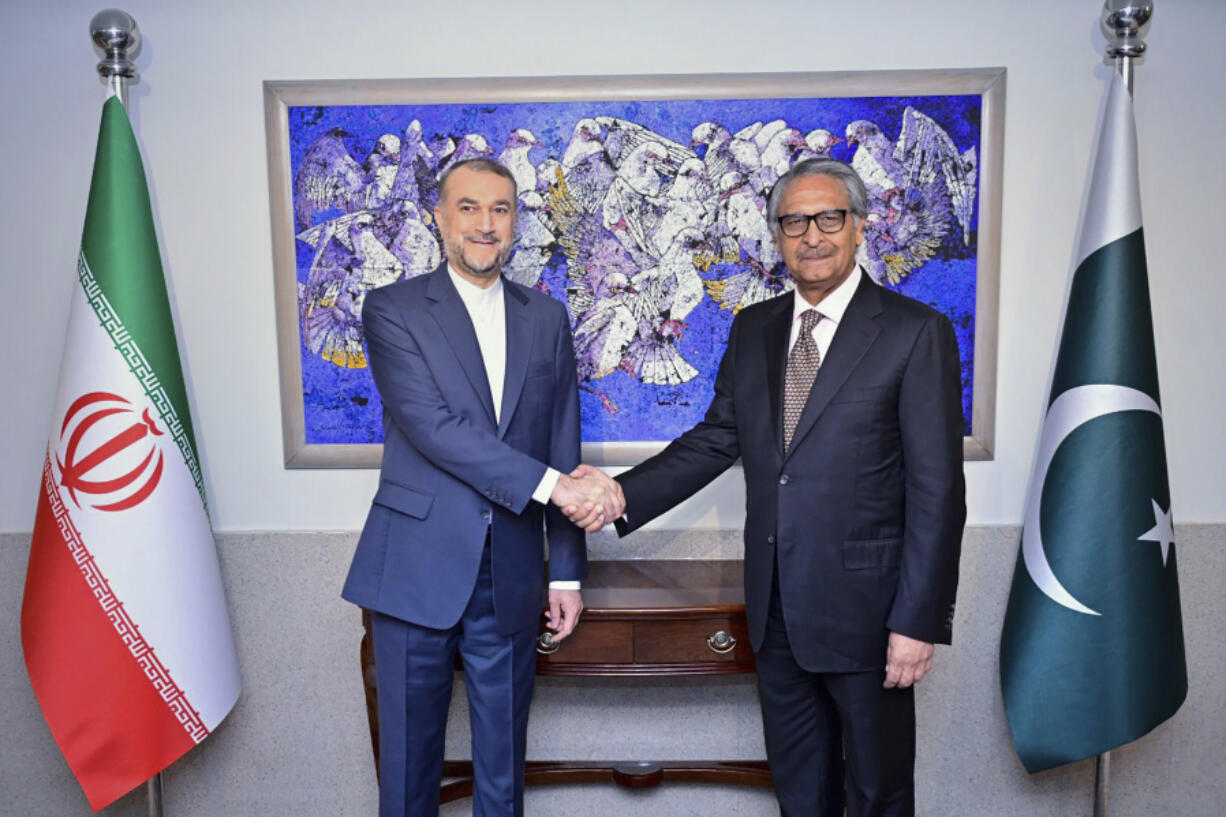In this photo released by Pakistan&rsquo;s Ministry of Foreign Affairs, visiting Iran&rsquo;s Foreign Minister Hossein Amirabdollahian, left, shakes hands with his Pakistani counterpart Jalil Abbas Jilani upon his arrival for a meeting at the Ministry of Foreign Affairs in Islamabad, Pakistan, Monday, Jan. 29, 2024. Iran&rsquo;s foreign minister was in Pakistan for talks on deescalating tensions after deadly airstrikes by Tehran and Islamabad earlier this month killed at least 11 people, marking a significant escalation in fraught relations between the neighbors.