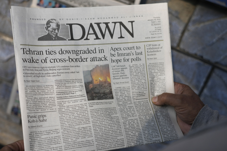 A Pakistani reads the front page of a morning newspaper covering Iran&rsquo;s strike, at a stall in Islamabad, Pakistan, Thursday, Jan. 18, 2024. Pakistan&rsquo;s air force launched retaliatory airstrikes early Thursday on Iran allegedly targeting militant positions, an attack that killed at least seven people and further raised tensions between the neighboring nations.