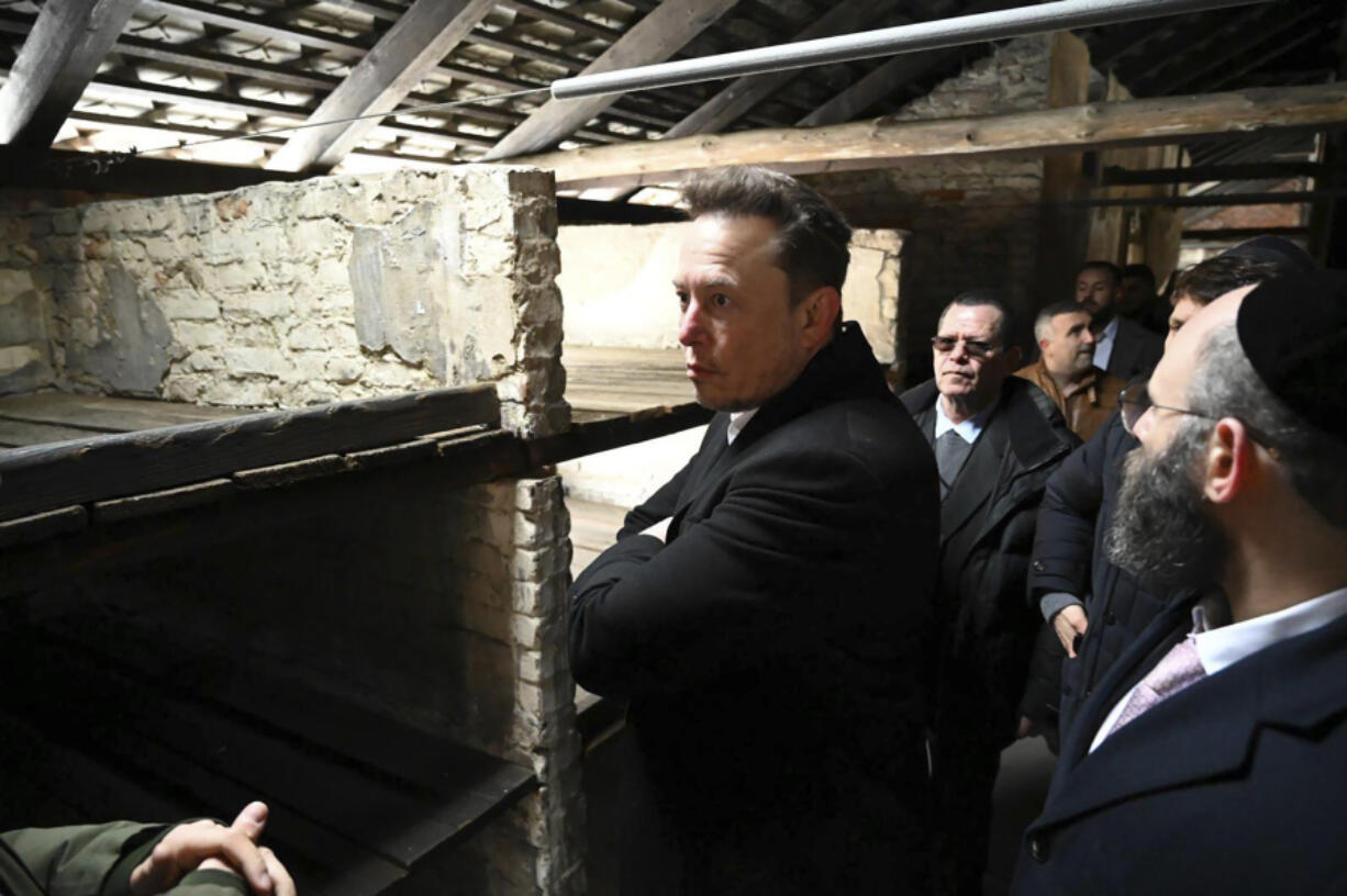 Elon Musk visits Auschwitz, claims he's 'Jewish by association