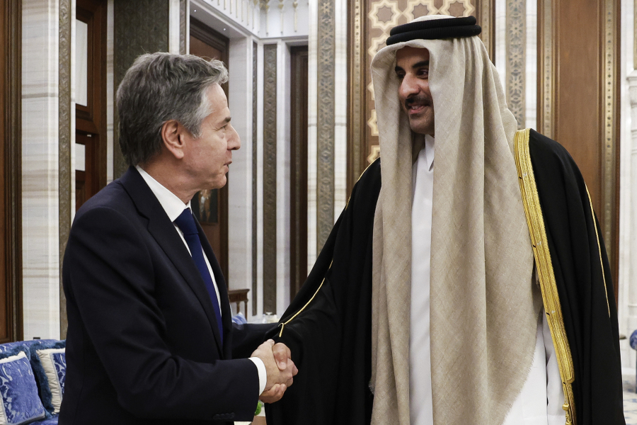 U.S. Secretary of State Antony Blinken, left, shakes hands with Qatar&#039;s Emir Sheikh Tamim Bin Hamad Al Thani, during Blinken&#039;s week-long trip aimed at calming tensions across the Middle East, at Lusail Palace in Lusail, Qatar, Sunday, Jan. 7, 2024.