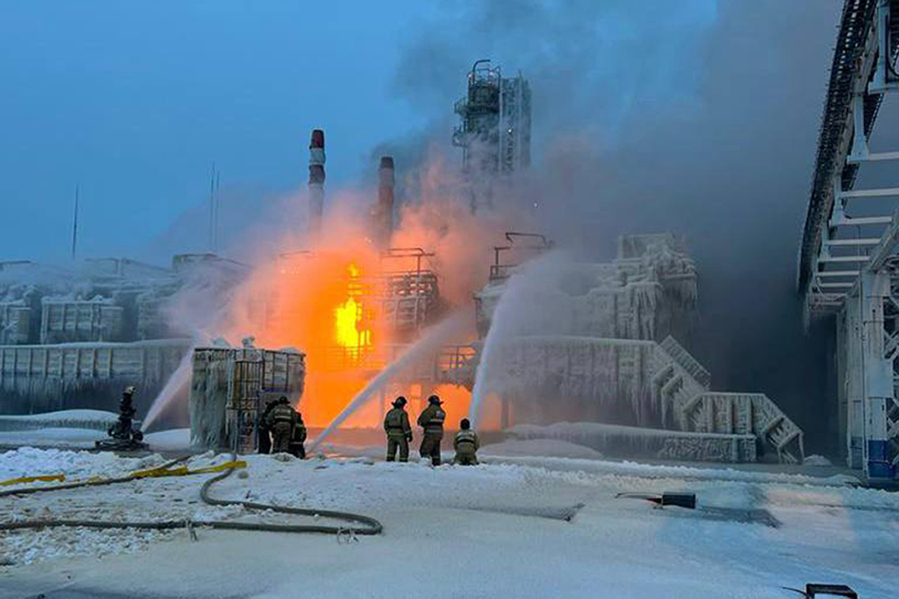 In this photo released by Telegram Channel of Leningrad Region Governor Alexander Drozdenko fire fighters extinguish the blaze at Russia&#039;s second-largest natural gas producer, Novatek in Ust-Luga, 165 kilometers southwest of St. Petersburg, Russia, Sunday, Jan. 21, 2024. Fire broke out at a chemical transport terminal at Russia&#039;s Ust-Luga port Sunday following two explosions, regional officials reported. Local media reported that the port had been attacked by Ukrainian drones, causing a gas tank to explode.