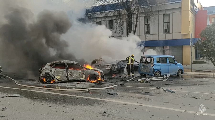 In this photo taken from video released by Russia Emergency Situations Ministry telegram channel on Saturday, Dec. 30, 2023, firefighters extinguish burning cars after shelling in Belgorod, Russia. Russian officials have accused Ukrainian forces of shelling the Russian border city of Belgorod. Two children were killed in Saturday&rsquo;s attack, regional governor Vyacheslav Gladkov said in a statement on social media. He also said that an unspecified number of people had been injured.