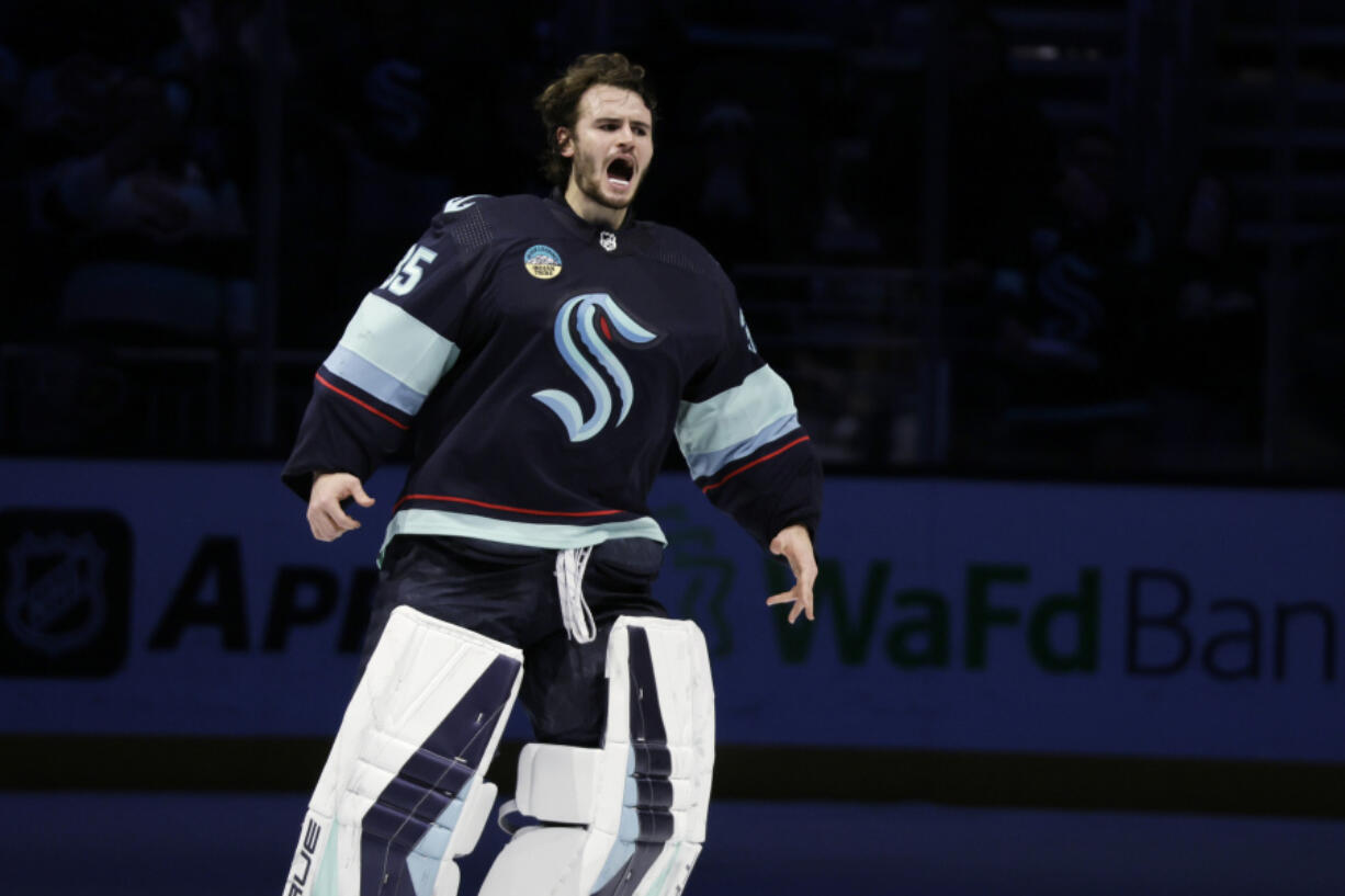Seattle Kraken goaltender Joey Daccord (35) yells after the team&rsquo;s 4-1 win over the Ottawa Senators in an NHL hockey game Thursday, Jan. 4, 2024, in Seattle.