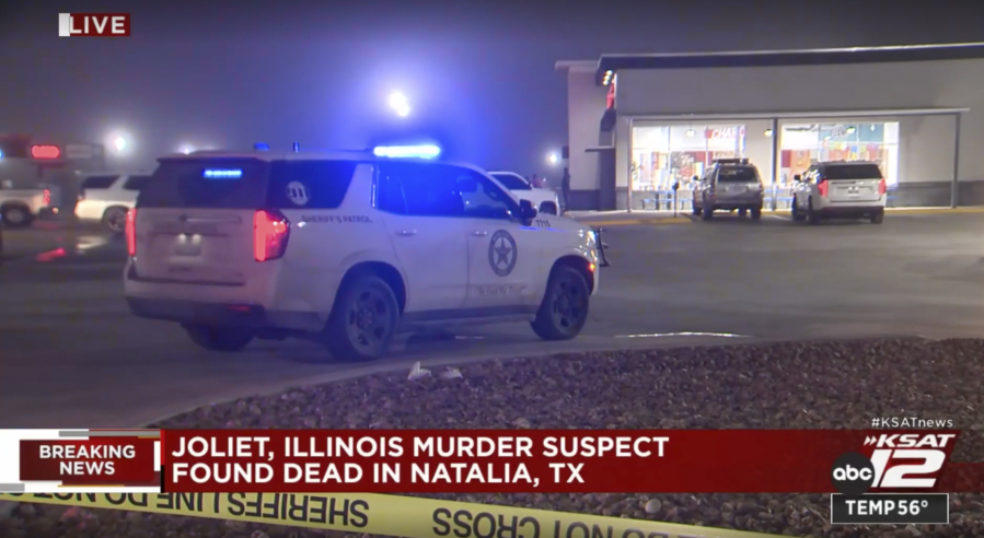 In this image taken from video provided by KSAT-TV ABC 12, authorities stage at a gas station in Natalia, Texas, late Monday, Jan. 22, 2024. A man suspected of shooting and killing multiple people in suburban Chicago fatally shot himself at the gas station after a confrontation with law enforcement officials, police said.
