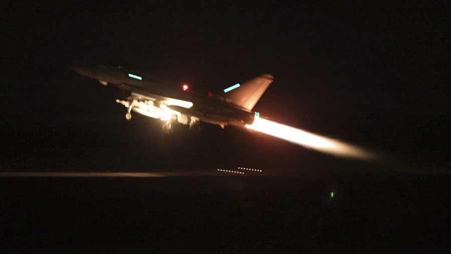 In this image provided by the UK Ministry of Defence taken on Thursday Jan. 11, 2024  shows an RAF Typhoon aircraft taking off from RAF Akrotiri in Cyprus, for a mission to strike targets in Yemen. The U.S. and British militaries bombed more than a dozen sites used by the Iranian-backed Houthis in Yemen late on Thursday, in a massive retaliatory strike using warship- and submarine-launched Tomahawk missiles and fighter jets, U.S. officials said.