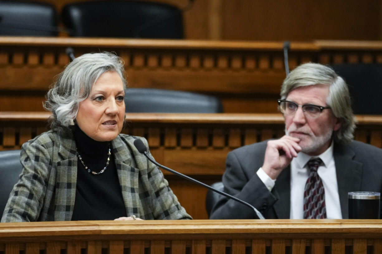 Sen. Lynda Wilson, R-Vancouver, ranking minority member of Senate Ways and Means Committee, speaks as Rep. Timm Ormsby, D-Spokane, chair of the House Appropriations Committee, looks on during a legislative session preview Thursday in Olympia.