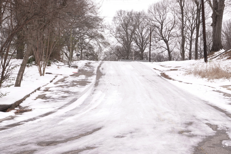 Many roads remained slick and full of ice Monday, Jan. 22, 2024, in Memphis, Tenn. Memphis and the the surrounding area has endured a week of sub-freezing temperatures, snow and ice.