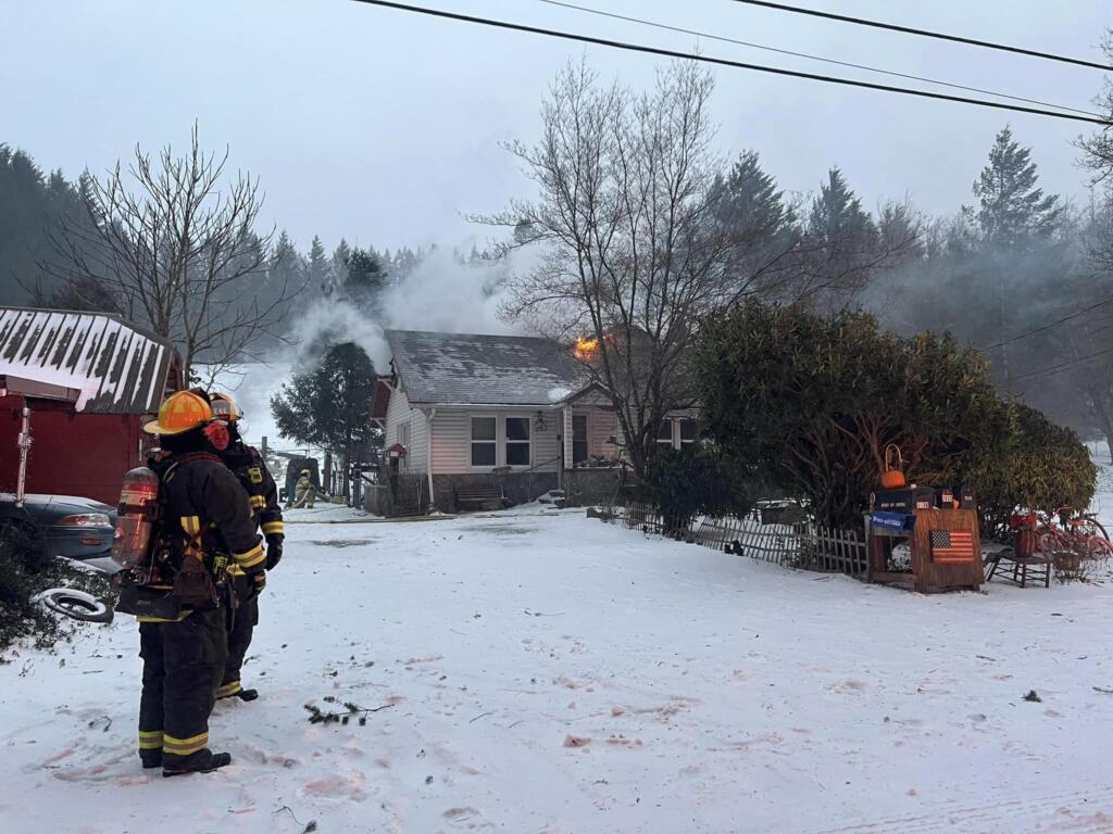 A two-alarm house fire in east Clark County was fanned by high winter winds Saturday, making firefighting conditions a challenges for East County Fire and Rescue. (East County Fire and Rescue)