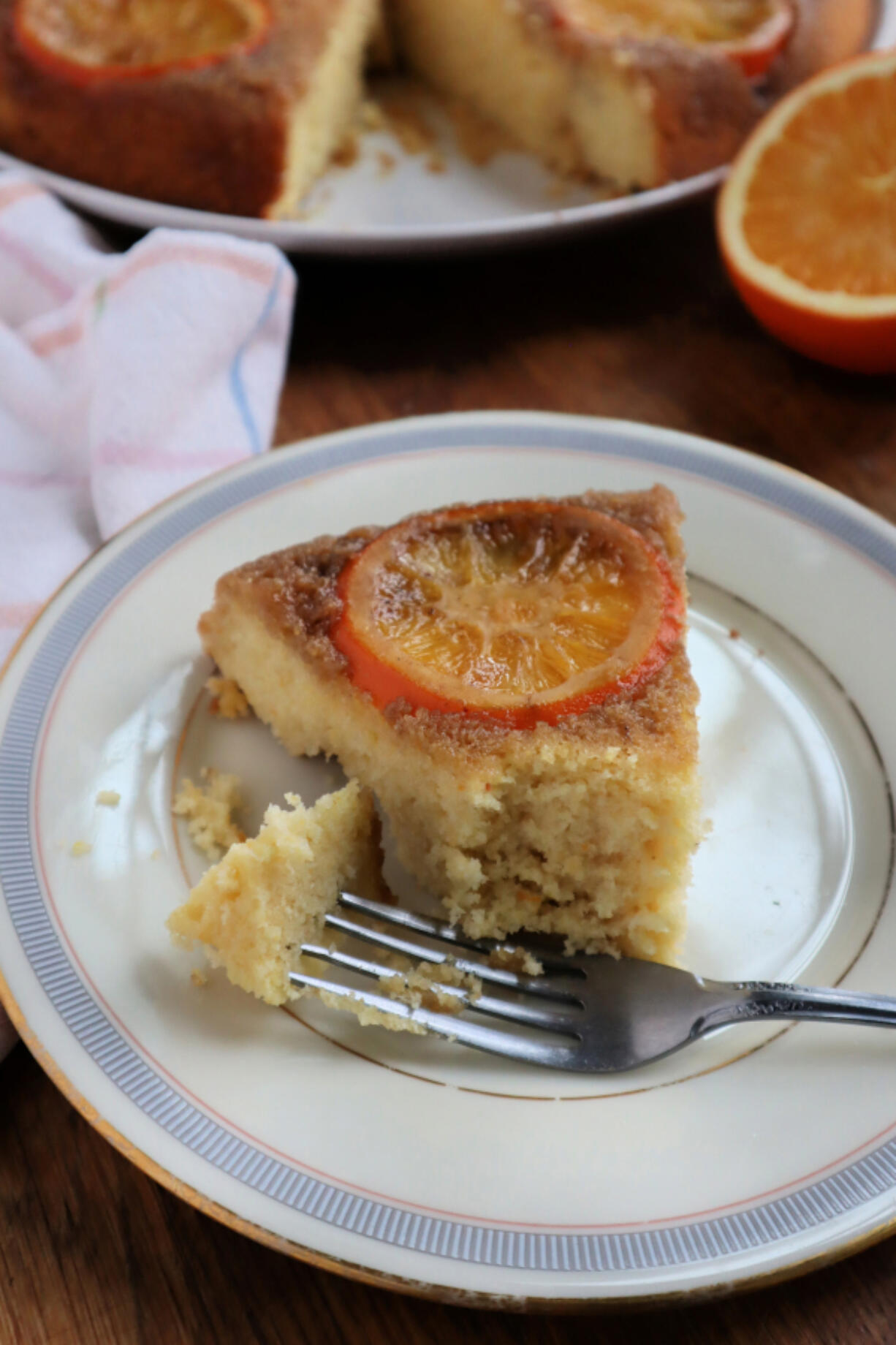 Flavored with orange zest and juice, the easy cornmeal cake is topped with a spiral of fresh orange slices that are candied during the baking process.