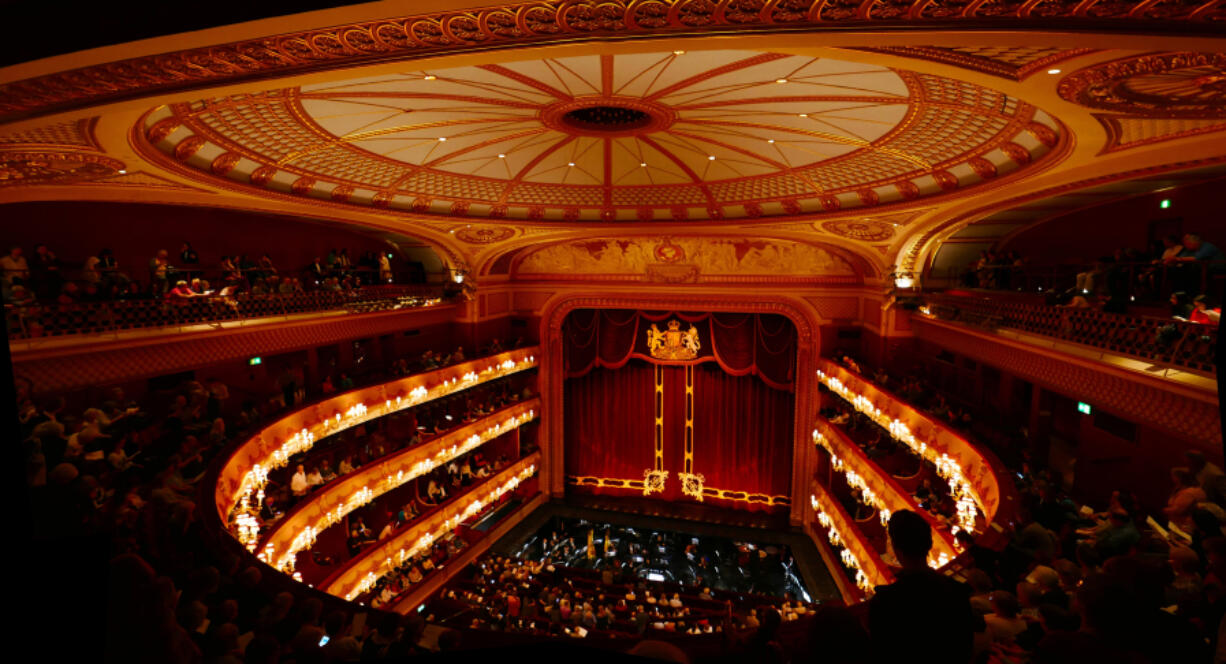 Patrons attend the Royal Opera House in London. Going to the opera or a classical music concert used to be a dress-up affair but standards have slacken in recent years.