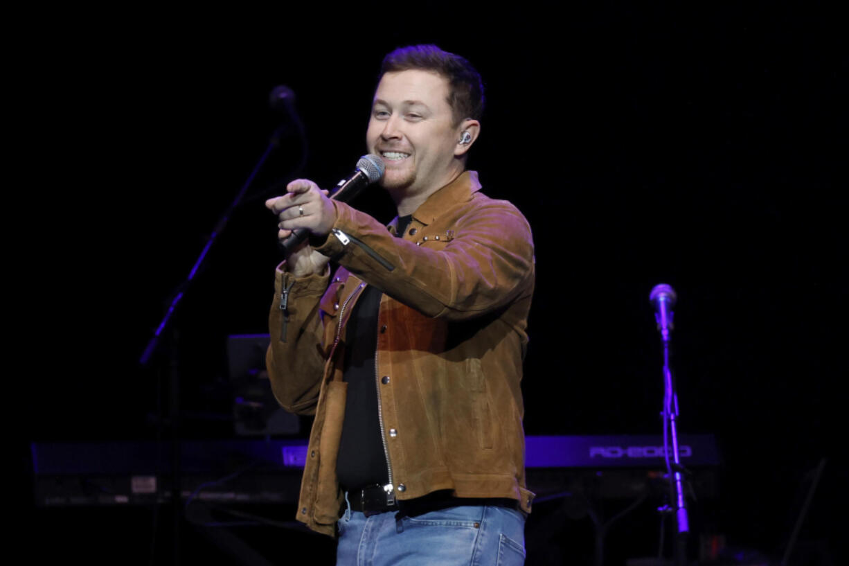 Scotty McCreery performs Oct. 3 for The Final Nashville Show - A Tribute To Ronnie Milsap at Bridgestone Arena in Nashville, Tenn.