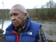 FILE - In this Jan. 13, 2014 file photo, Billy Frank Jr. poses for a photo near Frank&#039;s Landing on the Nisqually River in Nisqually, Wash. Frank, a Nisqually tribal elder who was arrested dozens of times while trying to assert his native fishing rights during the Fish Wars of the 1960s and &#039;70s, died Monday, May 5, 2014. He was 83. (AP Photo/Ted S.
