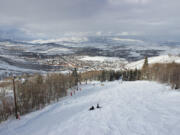 At roughly 7,000 feet above sea level, Park City, Utah, and its surroundings sit under a blanket of white snow during the peak winter season.