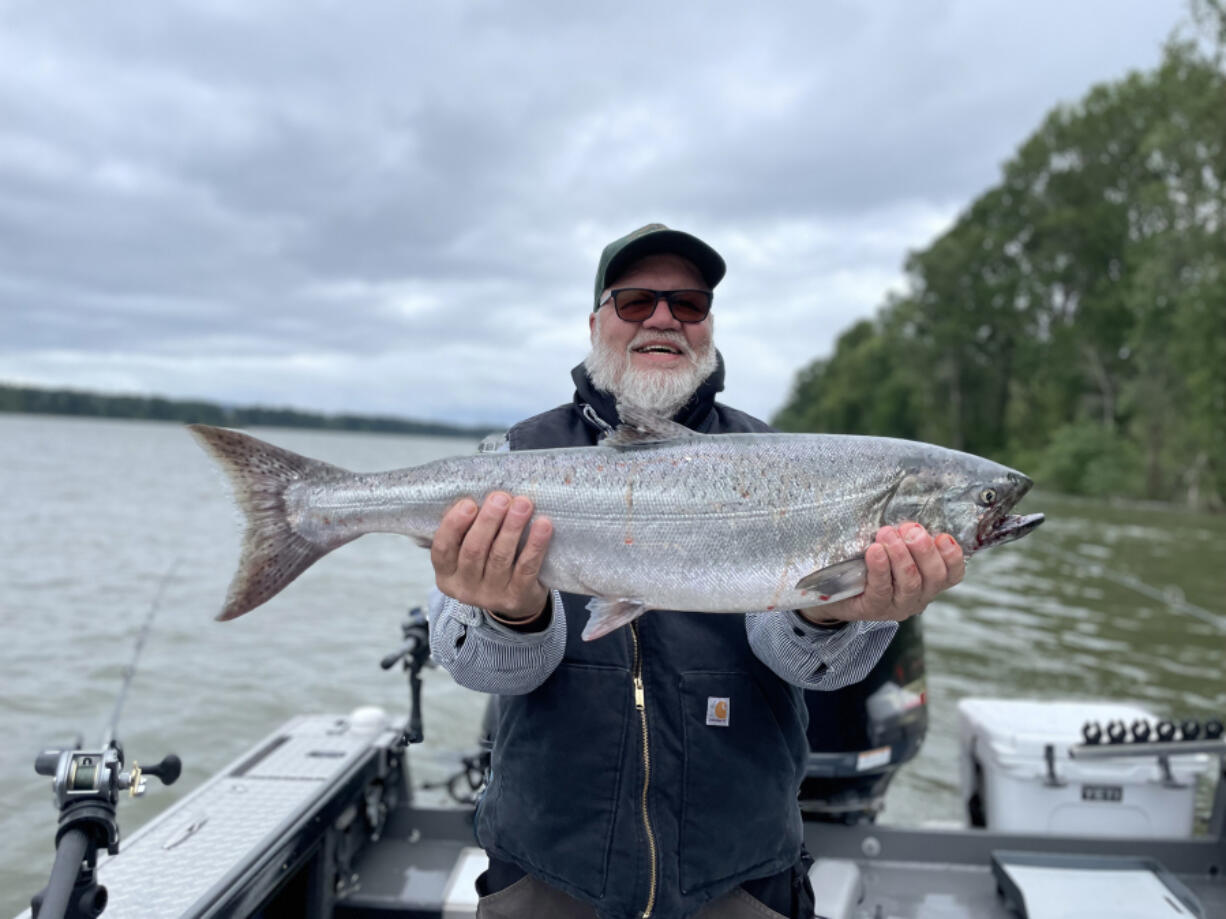 A Columbia River angler with a nice spring Chinook taken in the reach below Bonneville Dam while fishing with East Fork Outfitters. The spring Chinook seasons were released by the states on Wednesday.