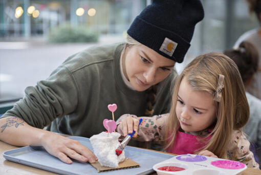 Keana Zoradi of Vancouver, left, joins her daughter, Eden, 3, while creating a Valentine's Day sculpture at Drip Drop Art Studio on Jan. 31. It’s one of several recently opened businesses geared toward Clark County’s youngest residents.