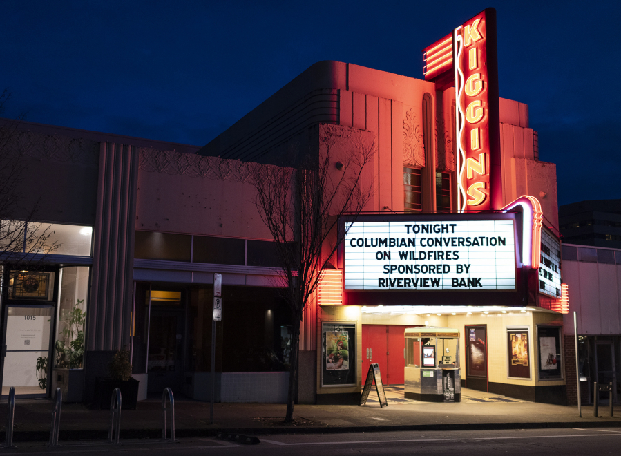 The Kiggins Theatre marquee sign is illuminated Thursday during the Columbian Conversations: Wildfires in Southwest Washington event.