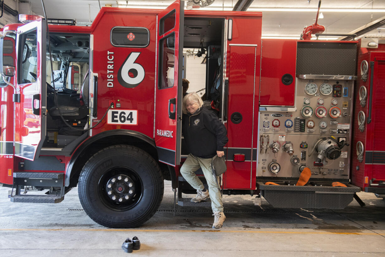 Clark County Councilor Sue Marshall returns to Fire Station 61 in Hazel Dell on Thursday morning after joining firefighters on a medical call. Marshall said it was enlightening to join the crews for calls for help instead of being the one to make the call for help.