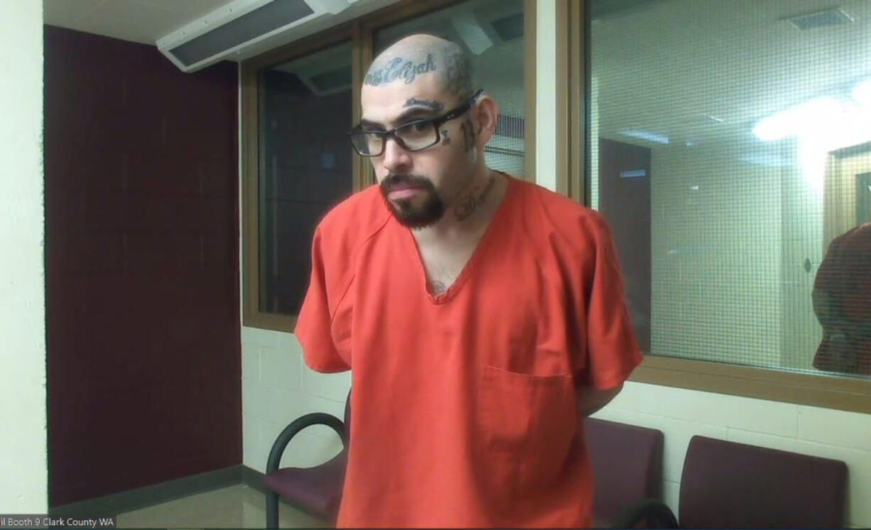 Abel Rodriguez, 35, appears Friday in Clark County Superior Court on suspicion of second-degree murder, drive-by shooting and first-degree assault. He&rsquo;s accused of shooting at two men walking on the sidewalk in central Vancouver, killing one of them.