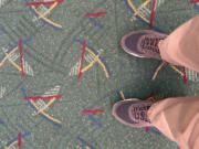Craig Brown/The Columbian 
 Before starting the Great Race to Seattle, I took the traditional  PDX airport carpet shot. I wear size 13.