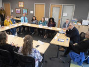 Gov. Jay Inslee, second from right, and his wife, Trudi, meet with local teachers, parents, administrators and staff in Vancouver to talk about special education challenges on Friday afternoon at Ogden Elementary School. Inslee said he planned to take stories about the staff&rsquo;s experience in special education with him to future conversations with state legislators about education funding challenges.