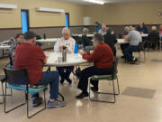 Residents gather at the Battle Ground Senior Center each Tuesday and Thursday to socialize, play pinochle and share a meal. After the city changed its rental fees, the Saturday pinochle group found a new home for it weekly gatherings.