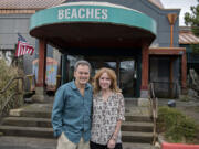 Mark Matthias, left, and Ali Novinger, owners of Beaches Restaurant and Bar, announced Monday they plan to retire and close the business Dec. 31.