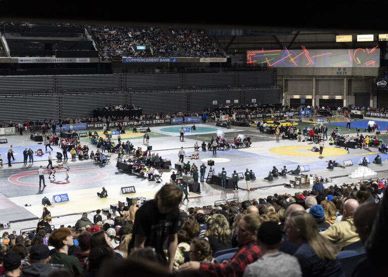 Attendees of Mat Classic XXXV watch championship matches Saturday, Feb. 17, 2024, during the Mat Classic state wrestling tournament at Tacoma Dome.
