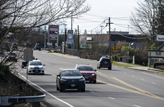 Traffic travels north Feb. 22 along a stretch of Highway 99 without sidewalks in Hazel Dell. Clark County Public Works will host an open house at 6 p.m. today about a project to add sidewalks to the north end of Highway 99.