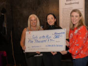 100 Women Who Care Clark County recently presented $5,100 to Girls on the Run Greater Oregon.