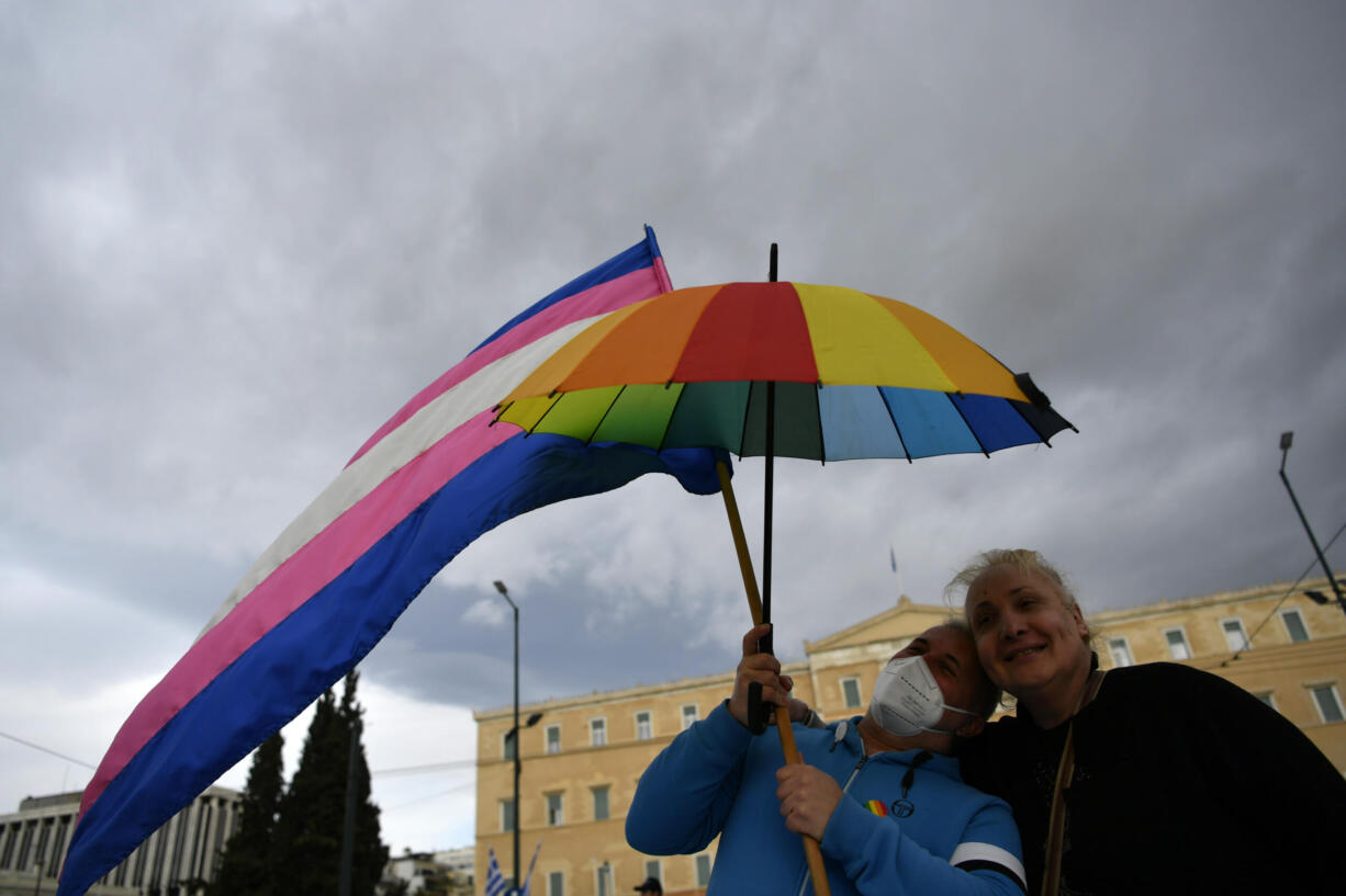 Supporters of same-sex marriage bill take part in a rally, at central Syntagma Square, in Athens, Greece, Thursday, Feb. 15, 2024. Greece's parliament is to vote Thursday to legalize same-sex civil marriage in a first for an Orthodox Christian country and despite opposition from the influential Greek Church.